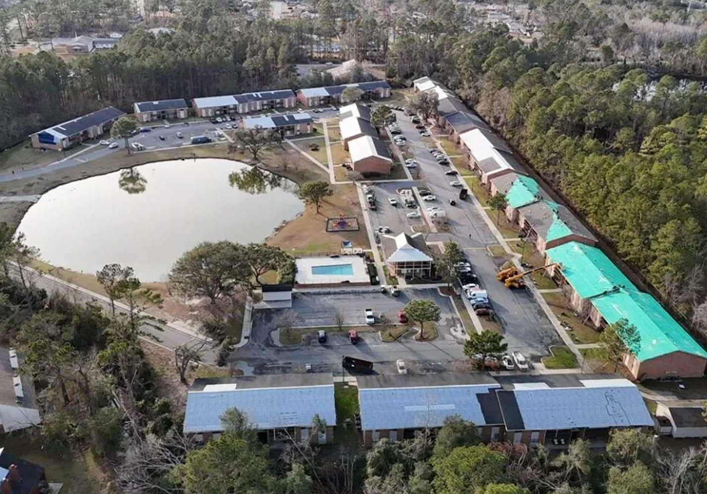 Close-up of a residential roof under installation, showing roofing materials and wooden decking in Orlando, Florida.